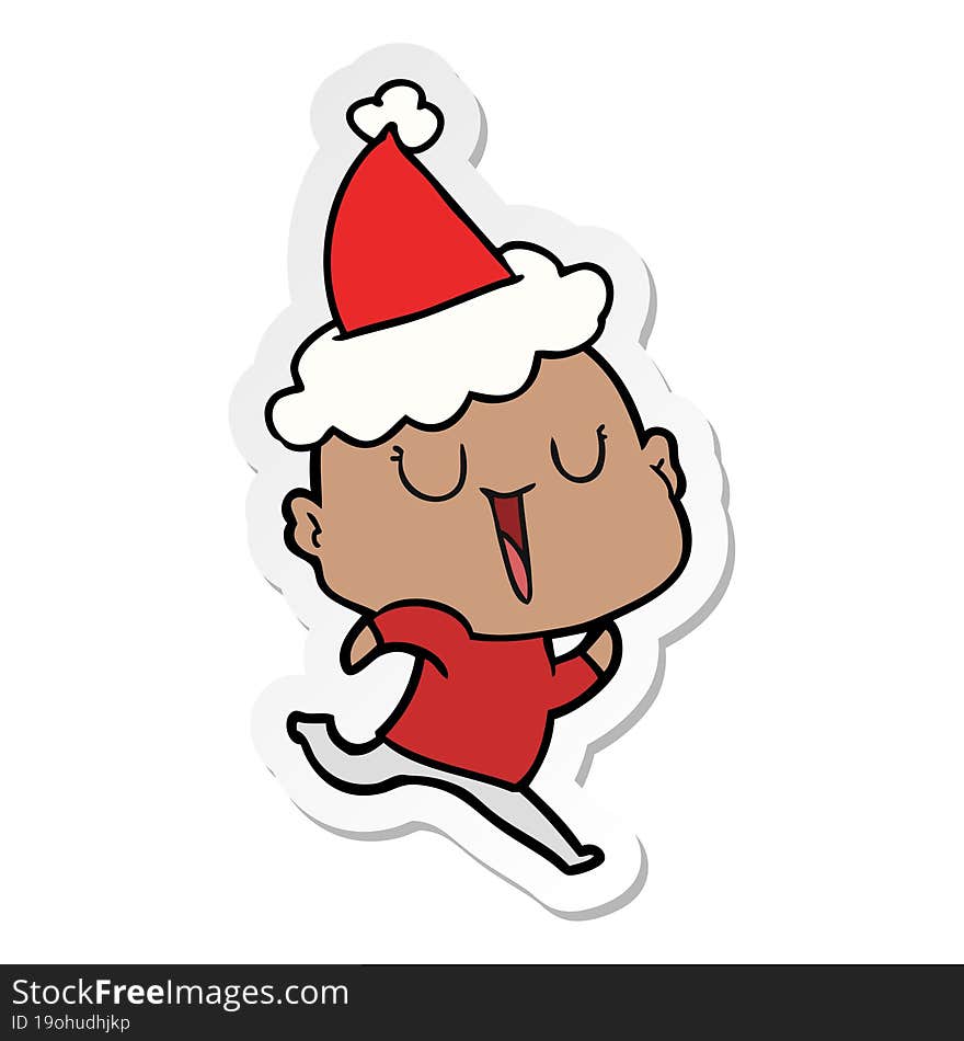 happy sticker cartoon of a bald man wearing santa hat