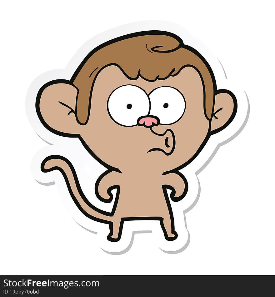 sticker of a cartoon hooting monkey