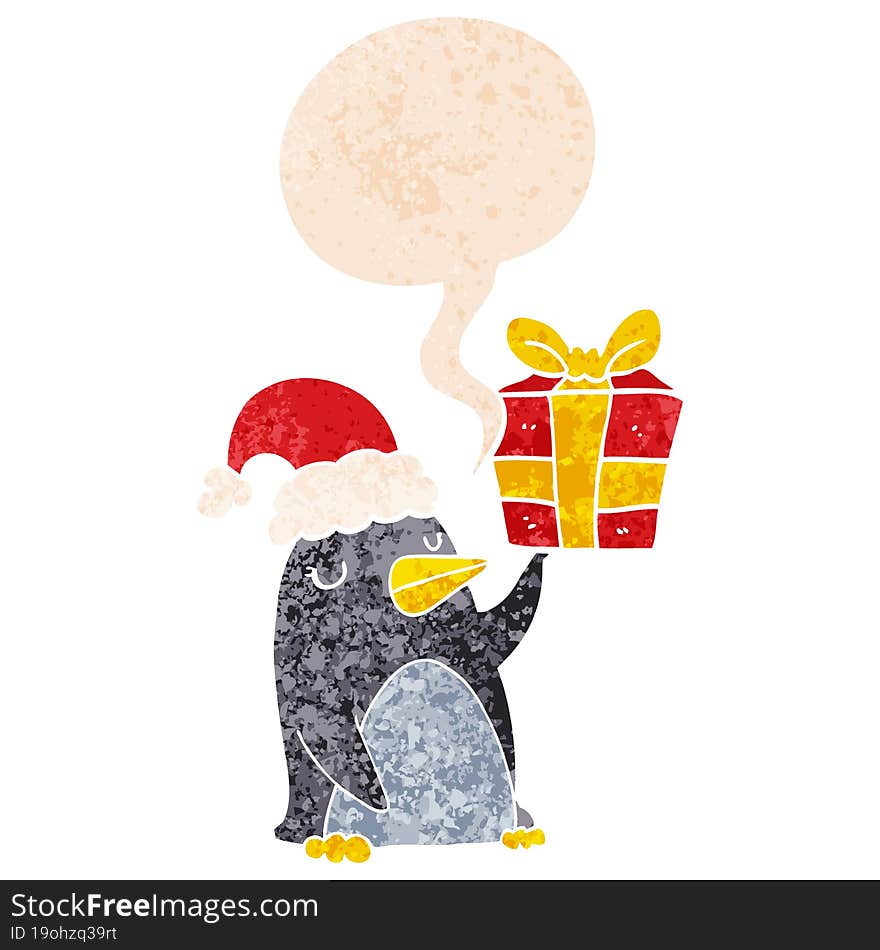 Cartoon Penguin With Christmas Present And Speech Bubble In Retro Textured Style