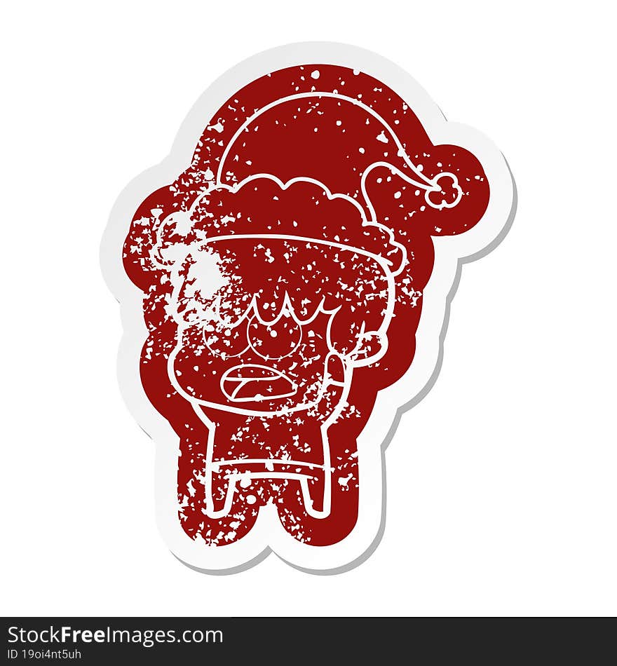 worried cartoon distressed sticker of a boy wearing santa hat