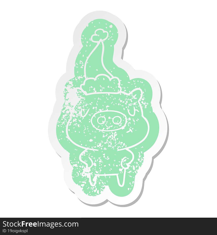 cartoon distressed sticker of a content pig wearing santa hat