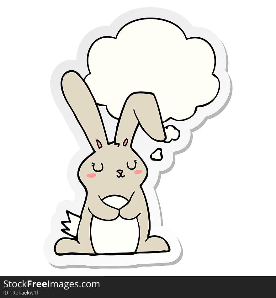 cartoon rabbit with thought bubble as a printed sticker