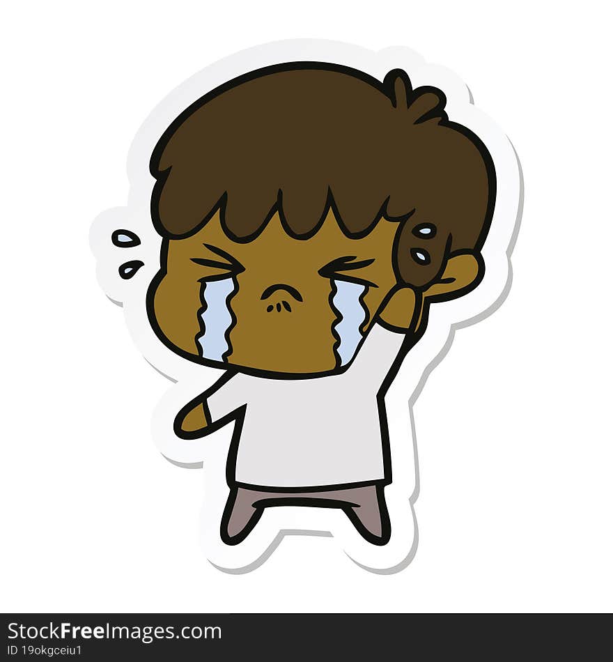 sticker of a cartoon boy crying