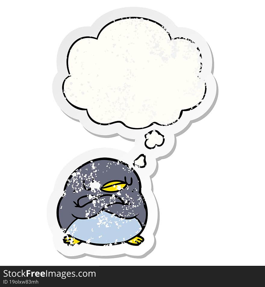 cartoon penguin and thought bubble as a distressed worn sticker