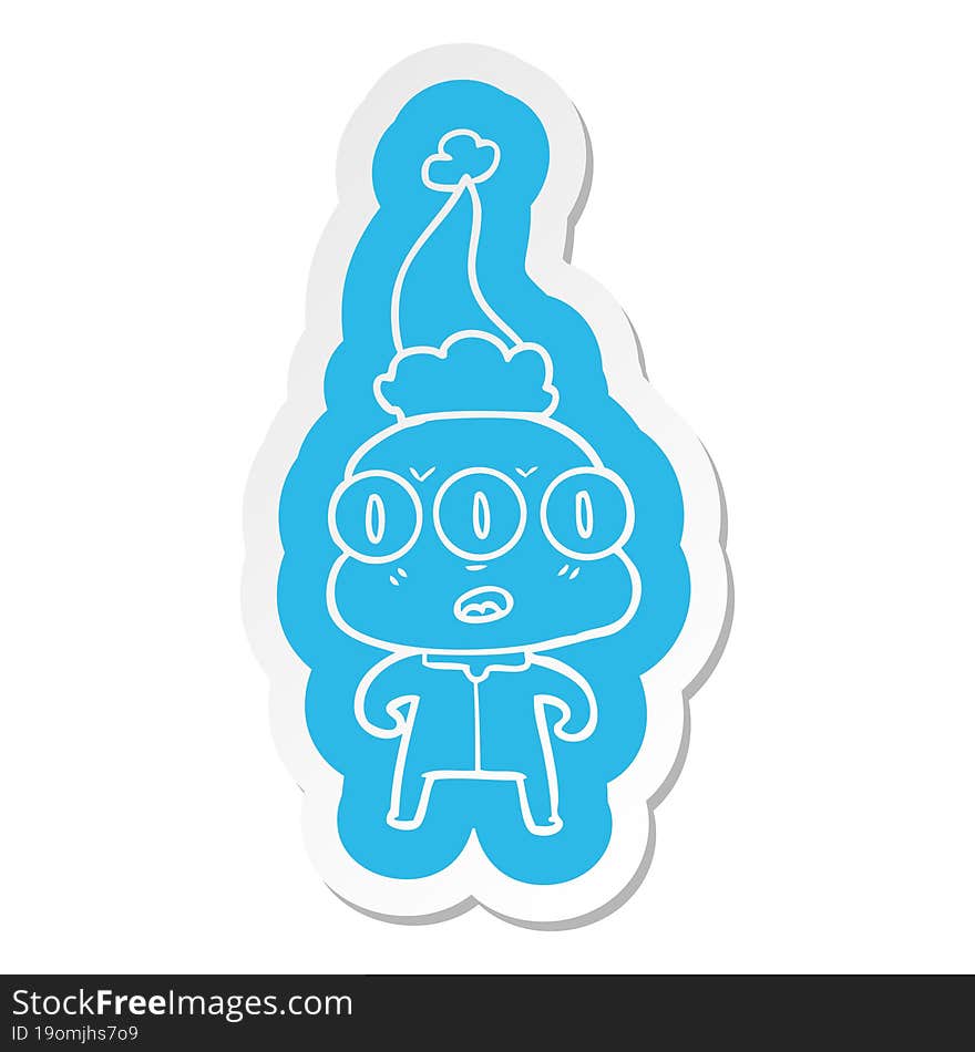 quirky cartoon  sticker of a three eyed alien wearing santa hat