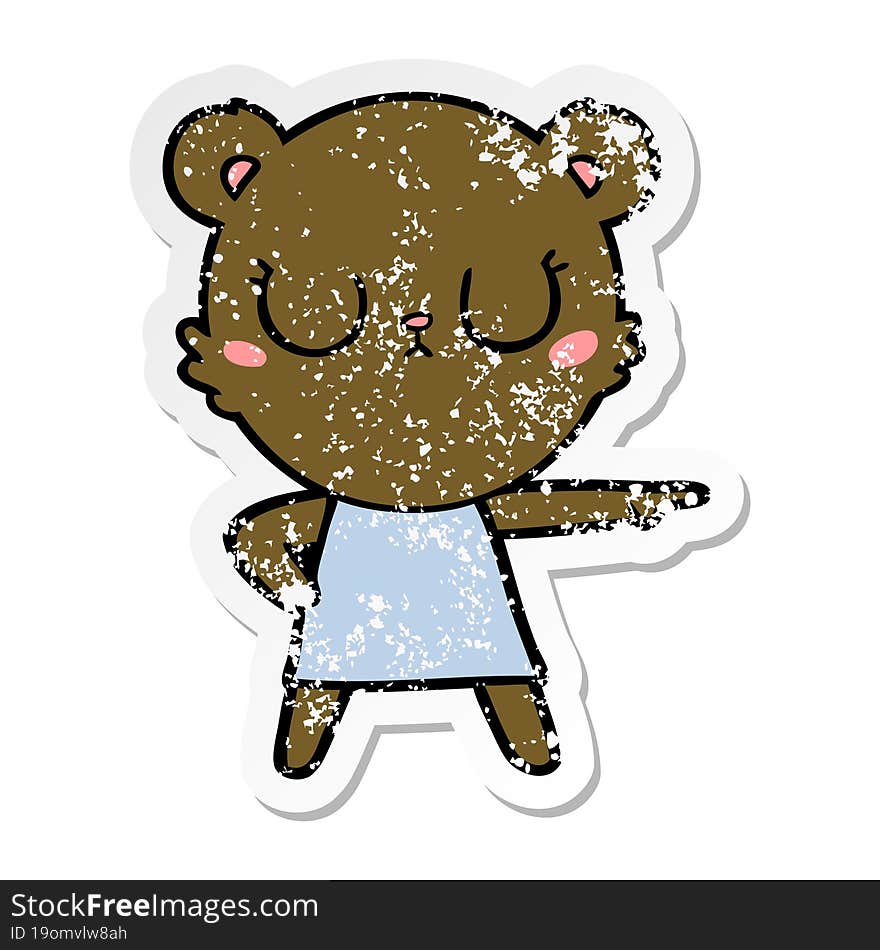 distressed sticker of a peaceful cartoon bear in dress pointing