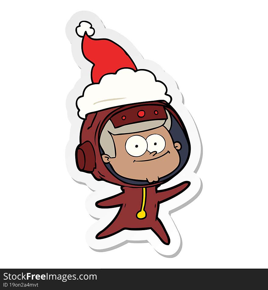 happy astronaut sticker cartoon of a wearing santa hat