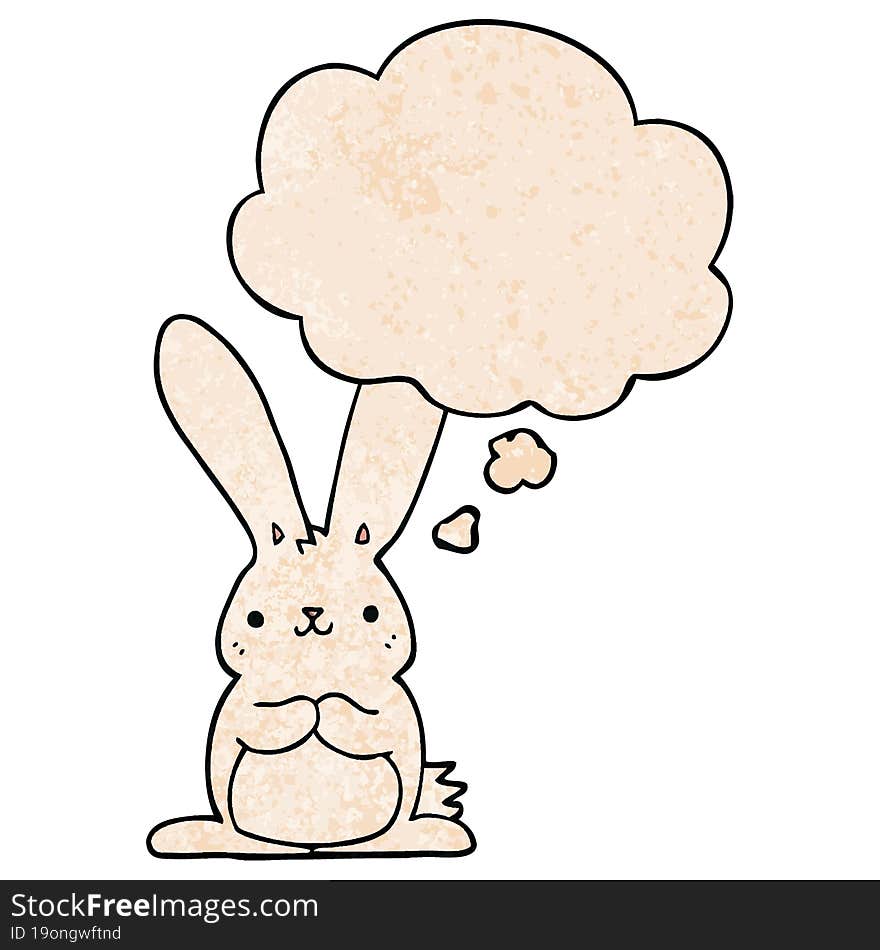 cartoon rabbit and thought bubble in grunge texture pattern style