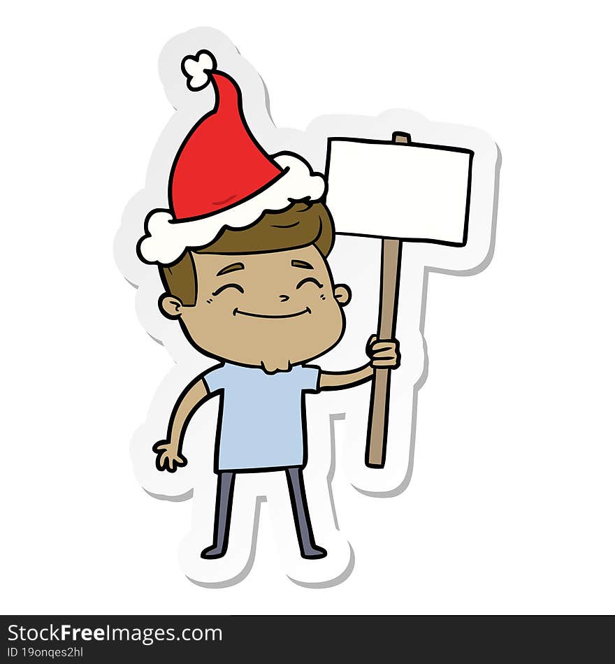 happy sticker cartoon of a man with placard wearing santa hat