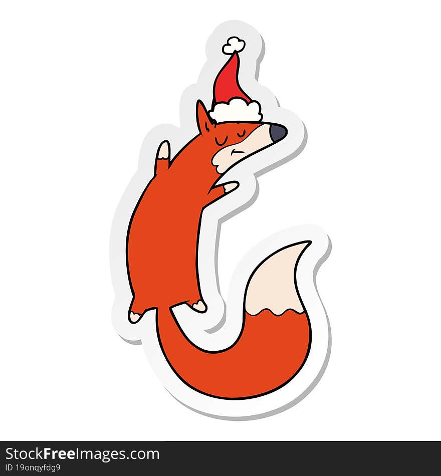 Sticker Cartoon Of A Jumping Fox Wearing Santa Hat