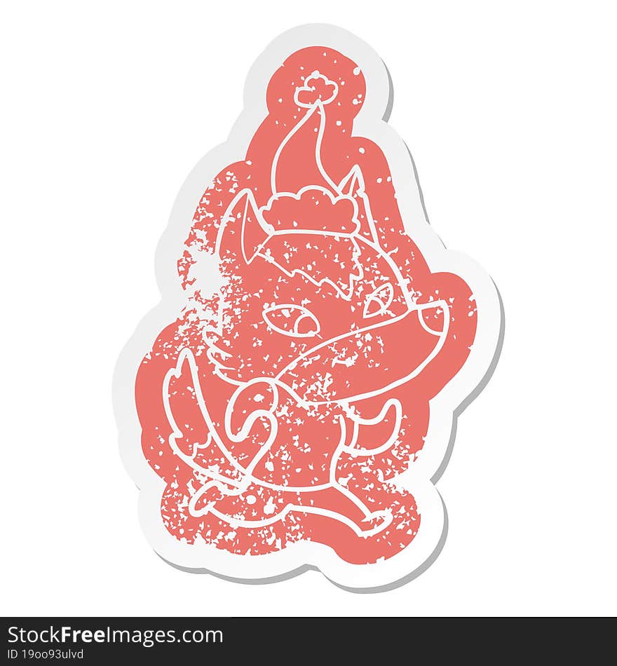 friendly cartoon distressed sticker of a wolf wearing santa hat