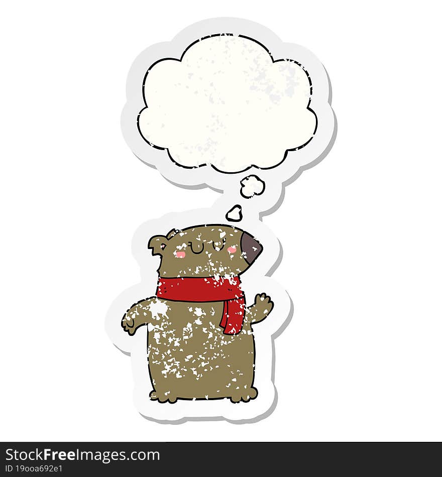 cartoon bear with scarf and thought bubble as a distressed worn sticker