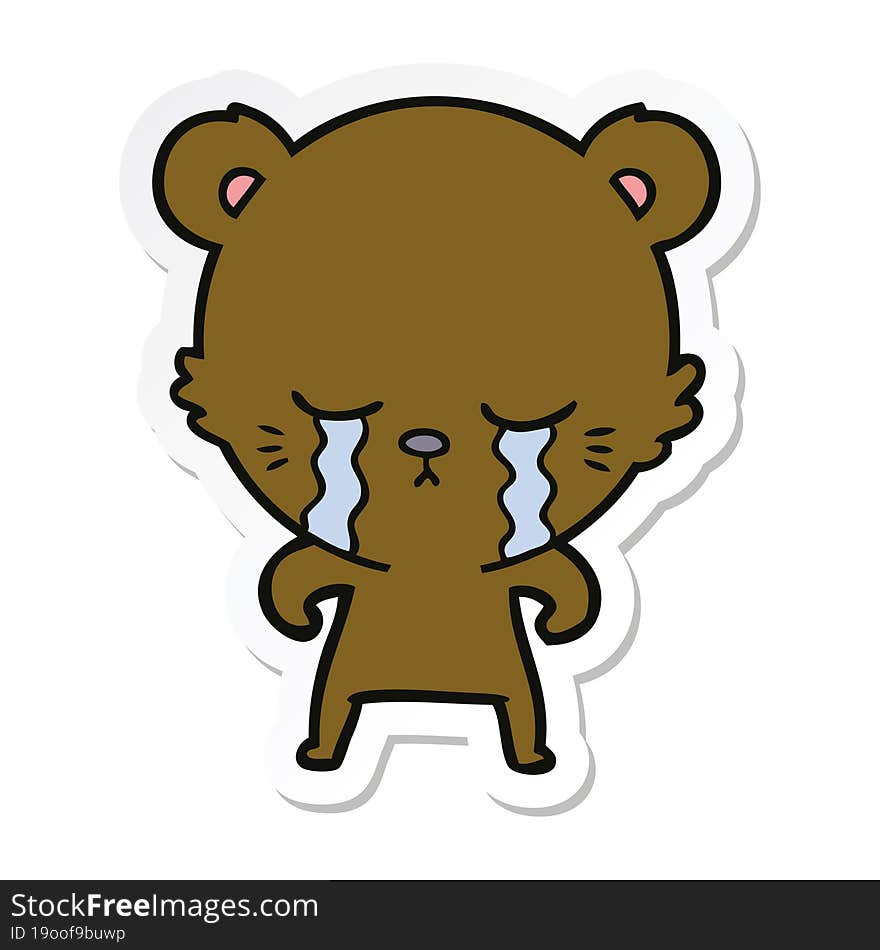 sticker of a crying cartoon bear