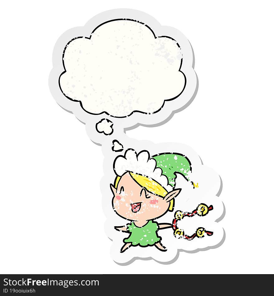 cartoon happy christmas elf and thought bubble as a distressed worn sticker