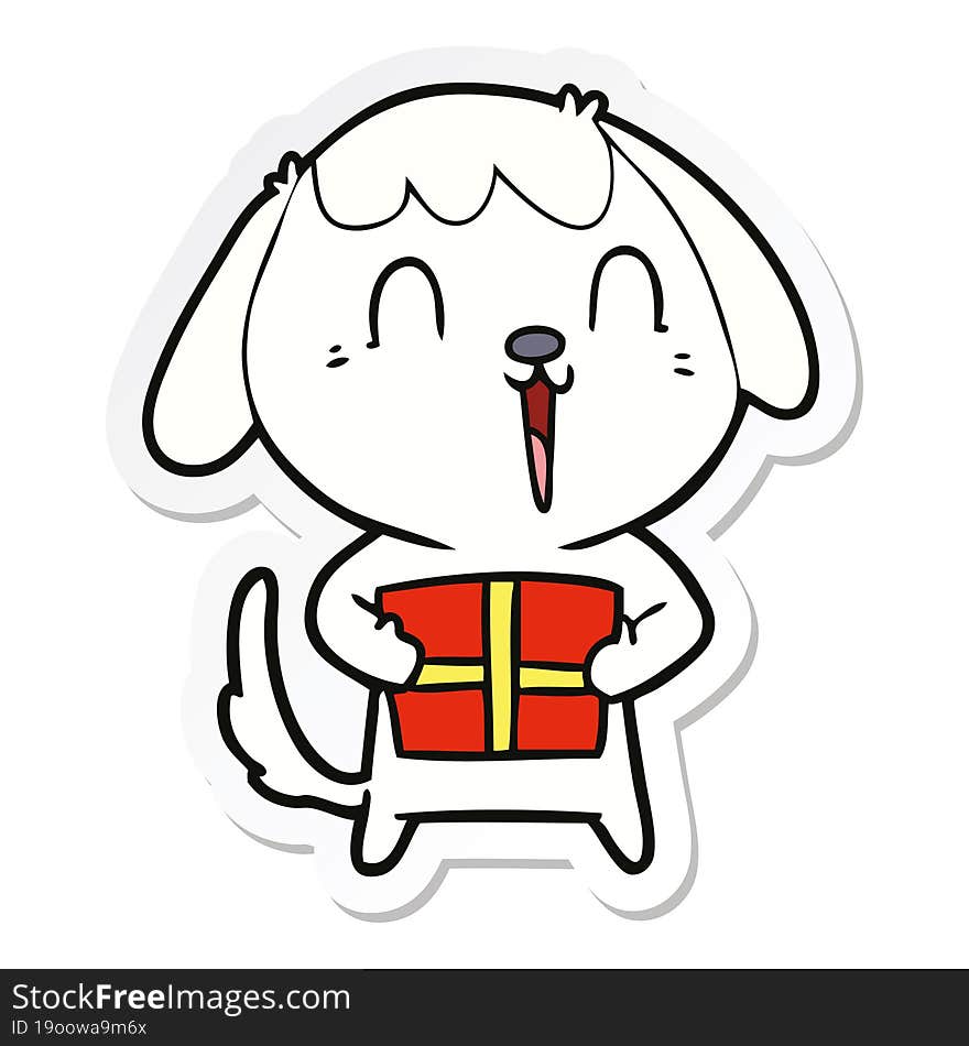 sticker of a cute cartoon dog with christmas present