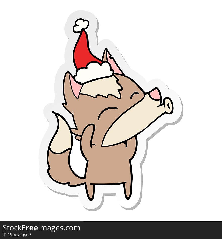 howling wolf sticker cartoon of a wearing santa hat