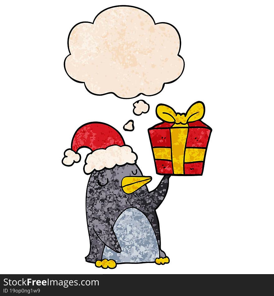 cartoon penguin with christmas present and thought bubble in grunge texture pattern style