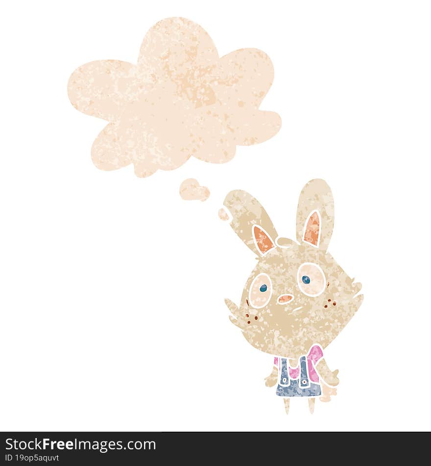 cartoon rabbit shrugging shoulders with thought bubble in grunge distressed retro textured style. cartoon rabbit shrugging shoulders with thought bubble in grunge distressed retro textured style