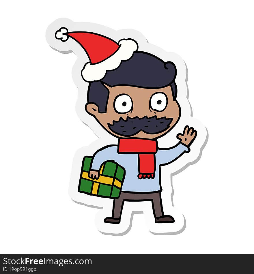 hand drawn sticker cartoon of a man with mustache and christmas present wearing santa hat