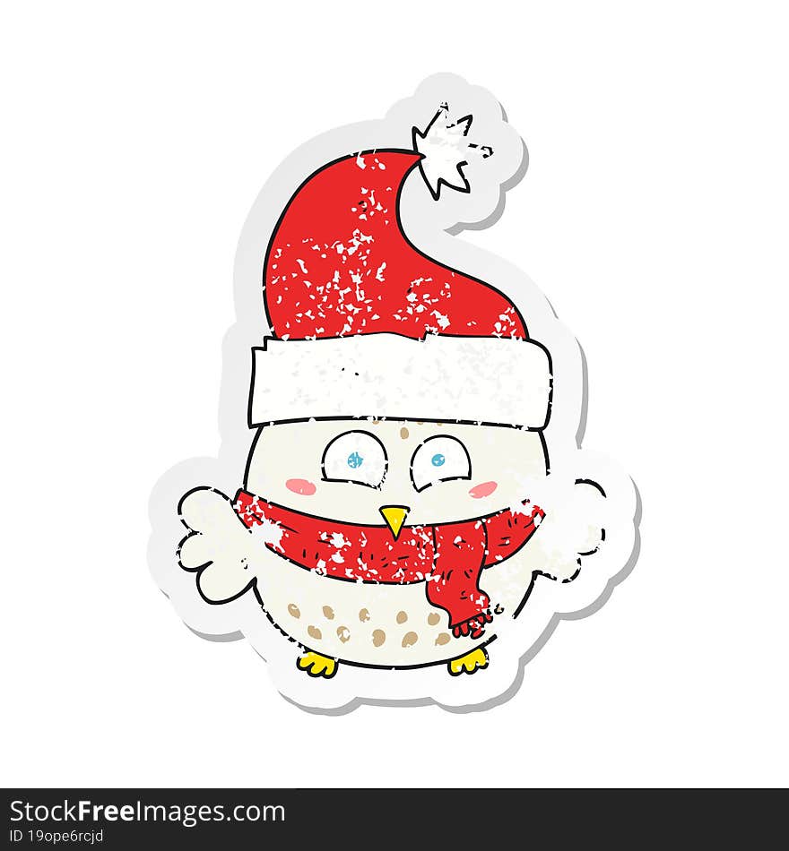 Retro Distressed Sticker Of A Cartoon Owl Wearing Christmas Hat