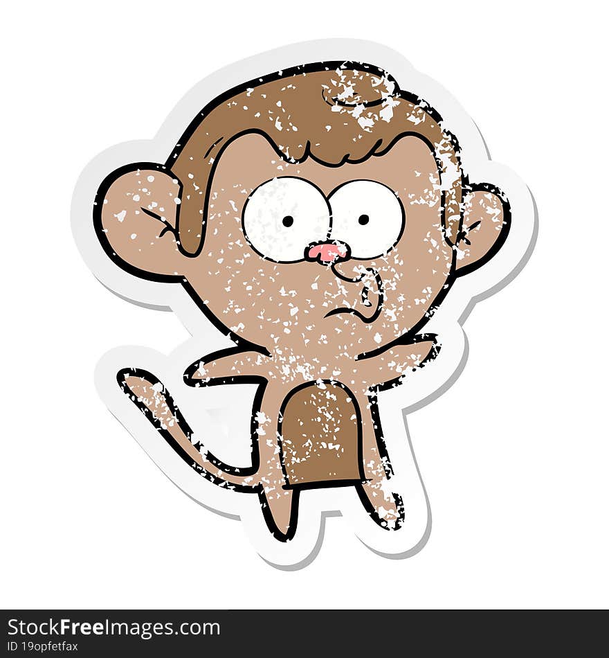 distressed sticker of a cartoon surprised monkey