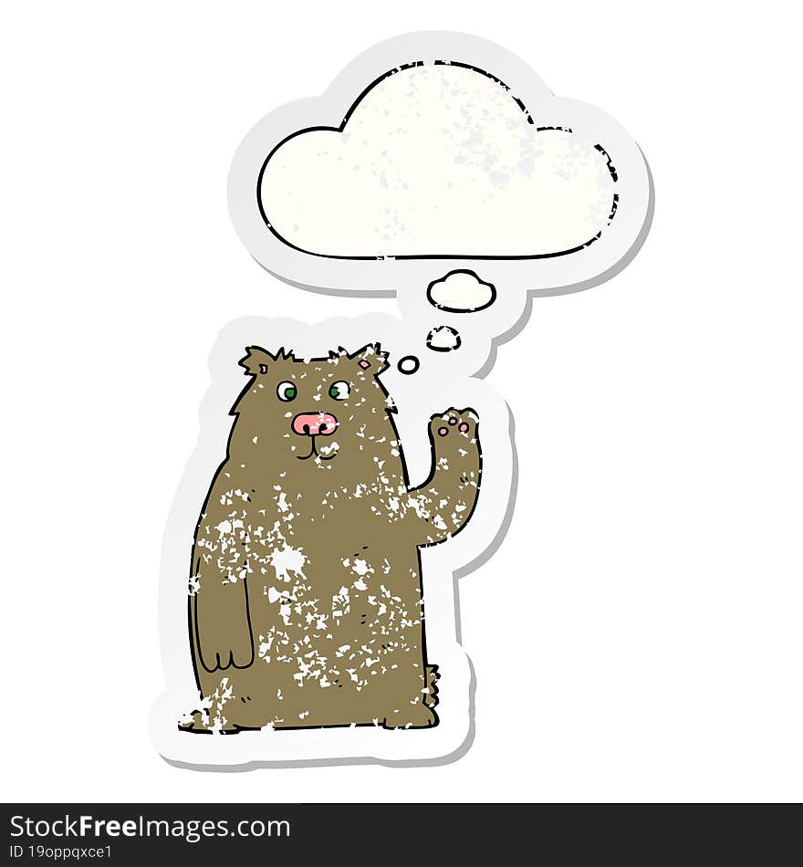 cartoon bear and thought bubble as a distressed worn sticker