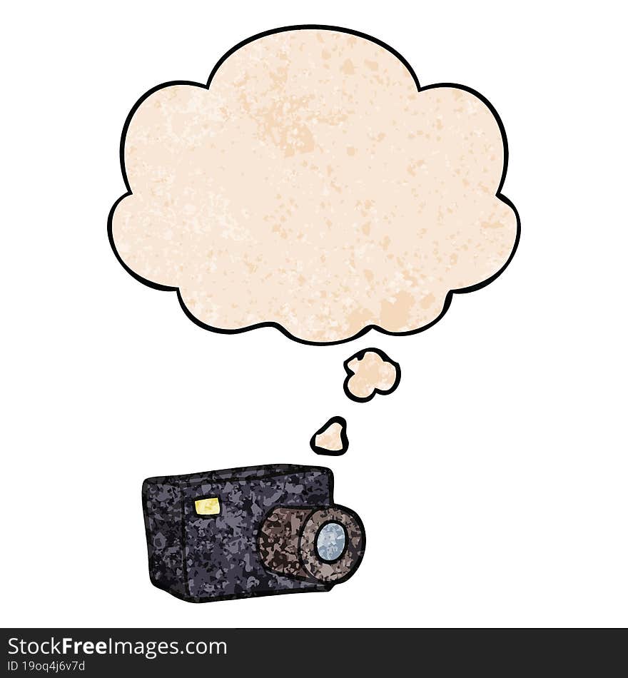 Cartoon Camera And Thought Bubble In Grunge Texture Pattern Style