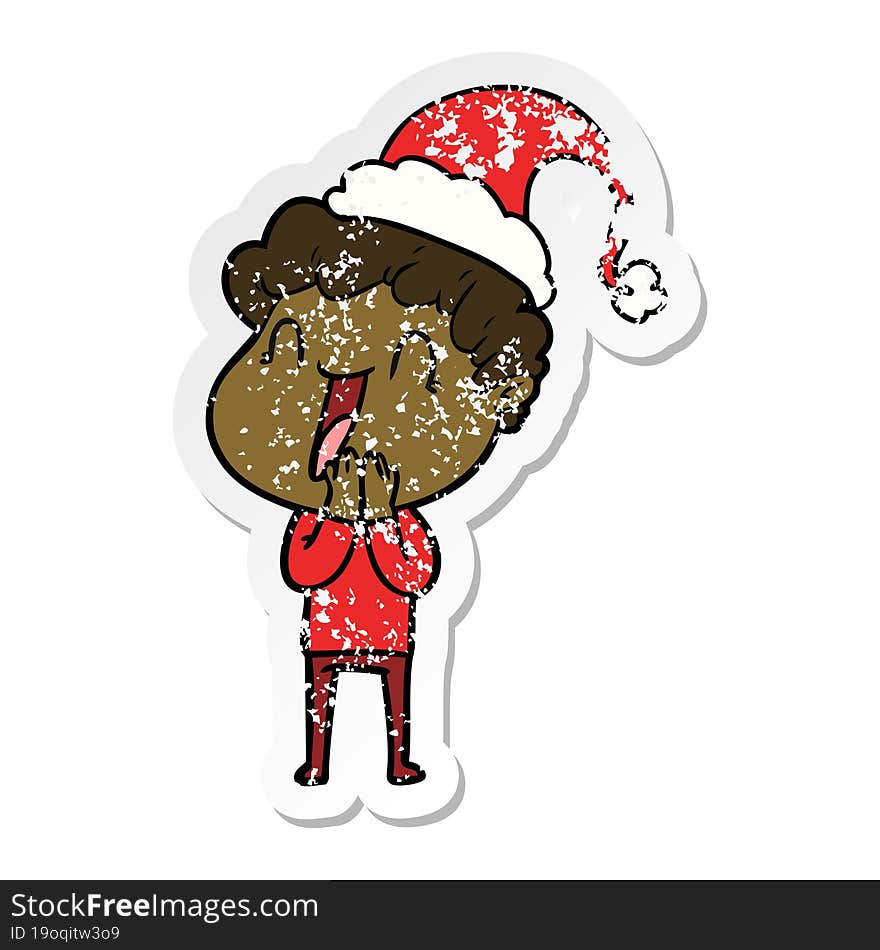 distressed sticker cartoon of a happy man wearing santa hat