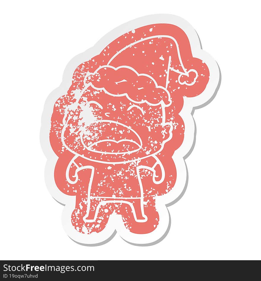 cartoon distressed sticker of a shouting bald man wearing santa hat