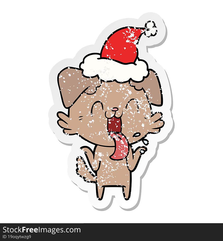 hand drawn distressed sticker cartoon of a panting dog shrugging shoulders wearing santa hat