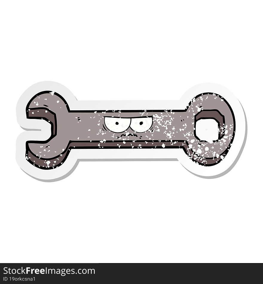 distressed sticker of a cartoon spanner