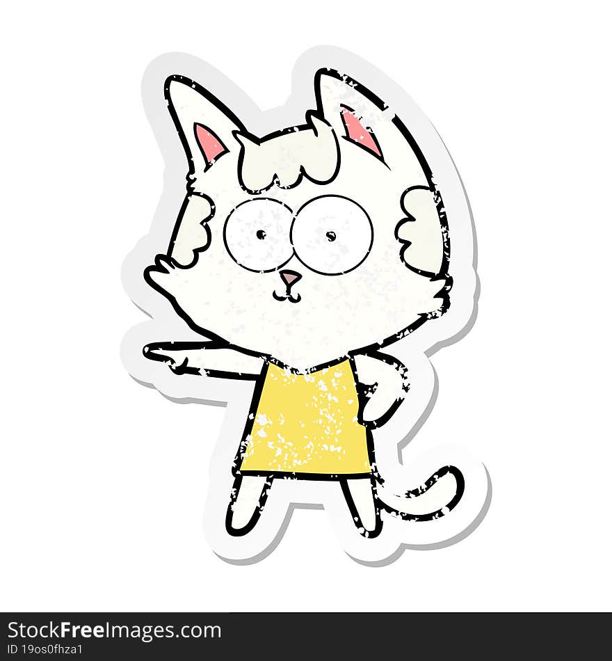 distressed sticker of a happy cartoon cat in dress pointing