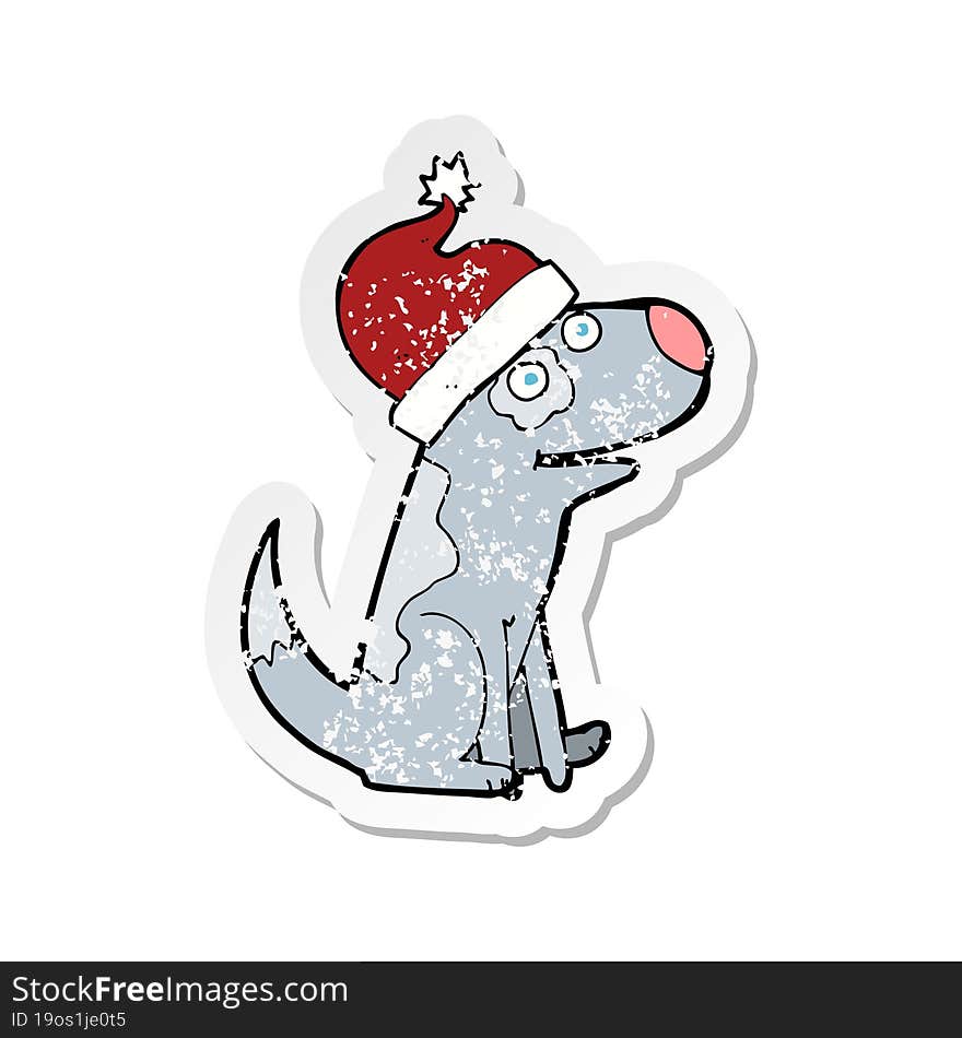 retro distressed sticker of a cartoon dog wearing christmas hat