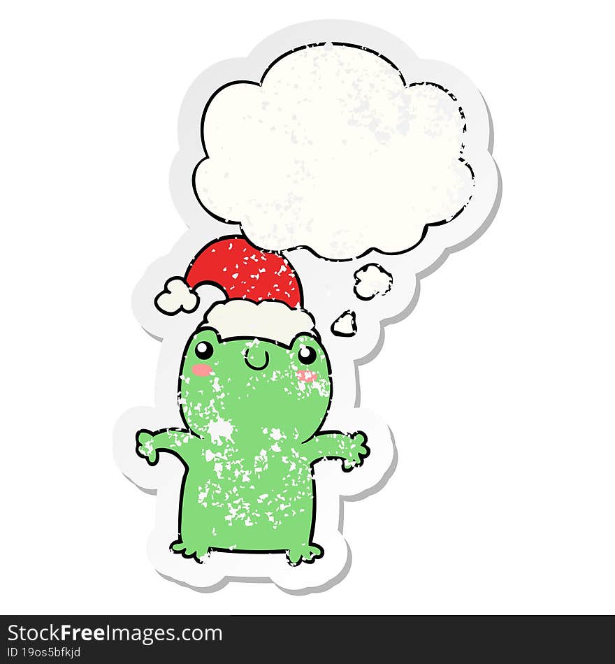 cute cartoon frog wearing christmas hat with thought bubble as a distressed worn sticker