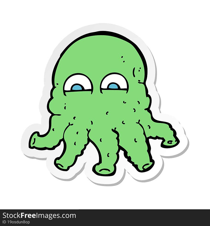 sticker of a cartoon alien squid face