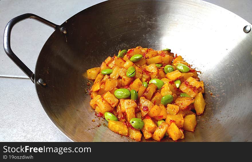 Potato And Petai Fried Chili Sauce Served In A Frying Pan