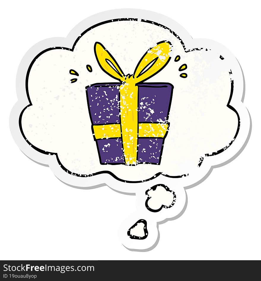 Cartoon Wrapped Gift And Thought Bubble As A Distressed Worn Sticker