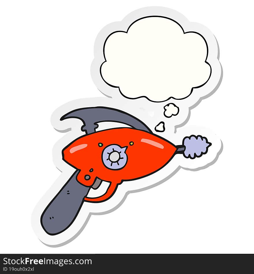 cartoon ray gun and thought bubble as a printed sticker