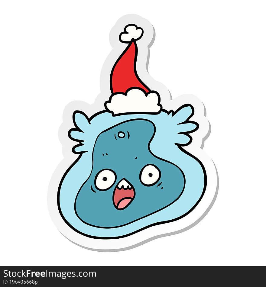 sticker cartoon of a germ wearing santa hat