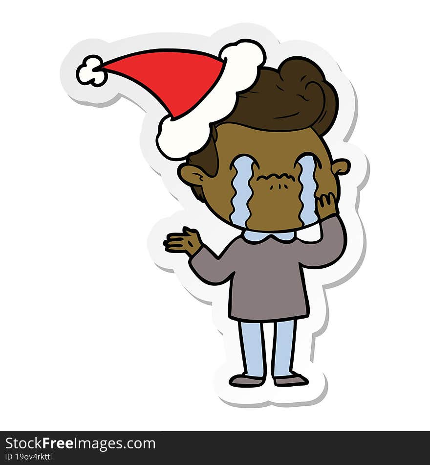 hand drawn sticker cartoon of a man crying wearing santa hat