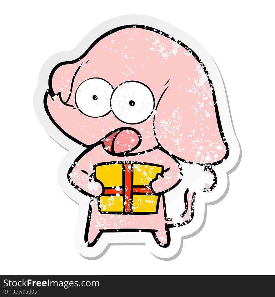 Distressed Sticker Of A Cute Cartoon Elephant With Christmas Present