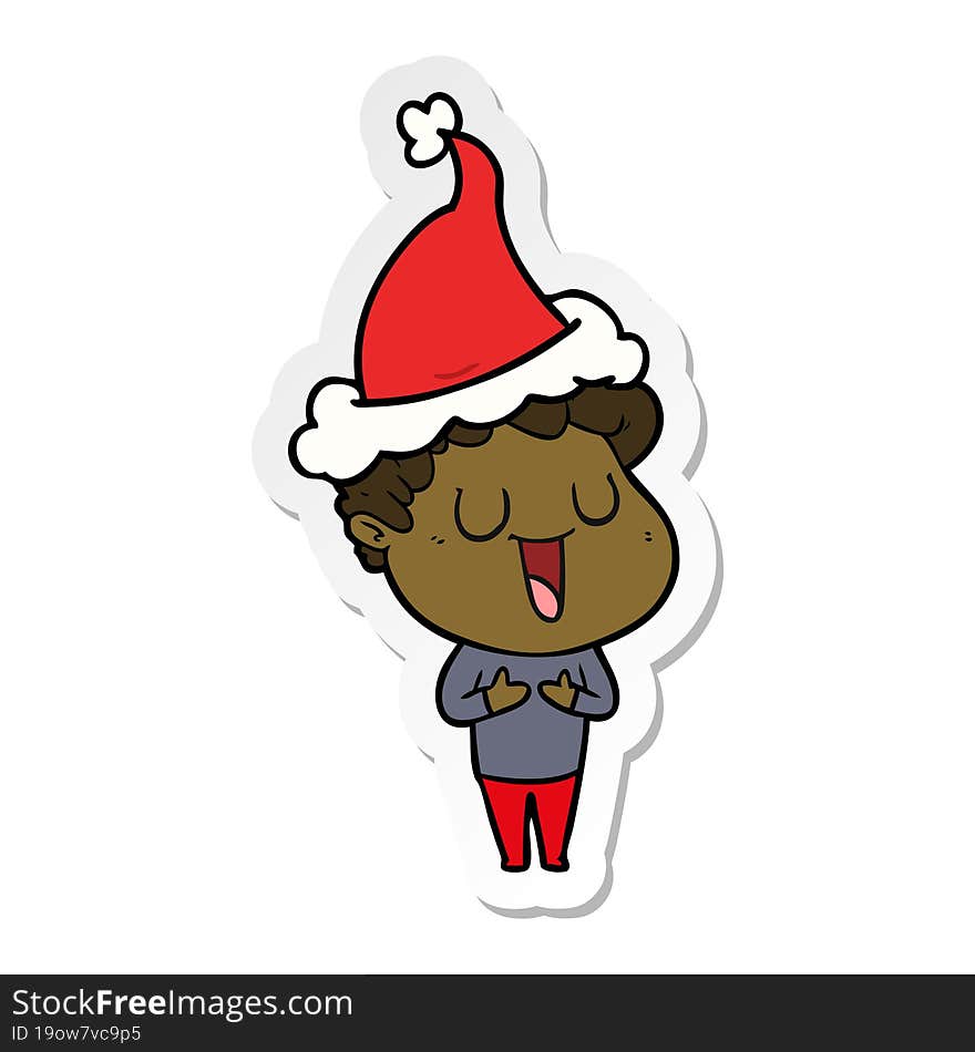 laughing sticker cartoon of a man wearing santa hat