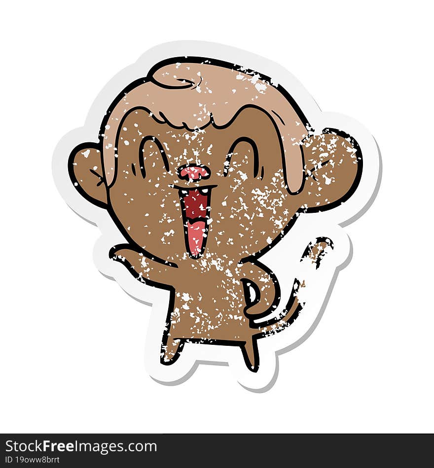 distressed sticker of a cartoon laughing monkey