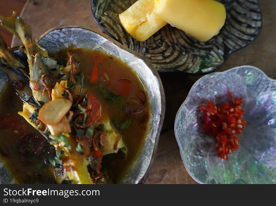 Fish Soup With Casava On The Wooden Table