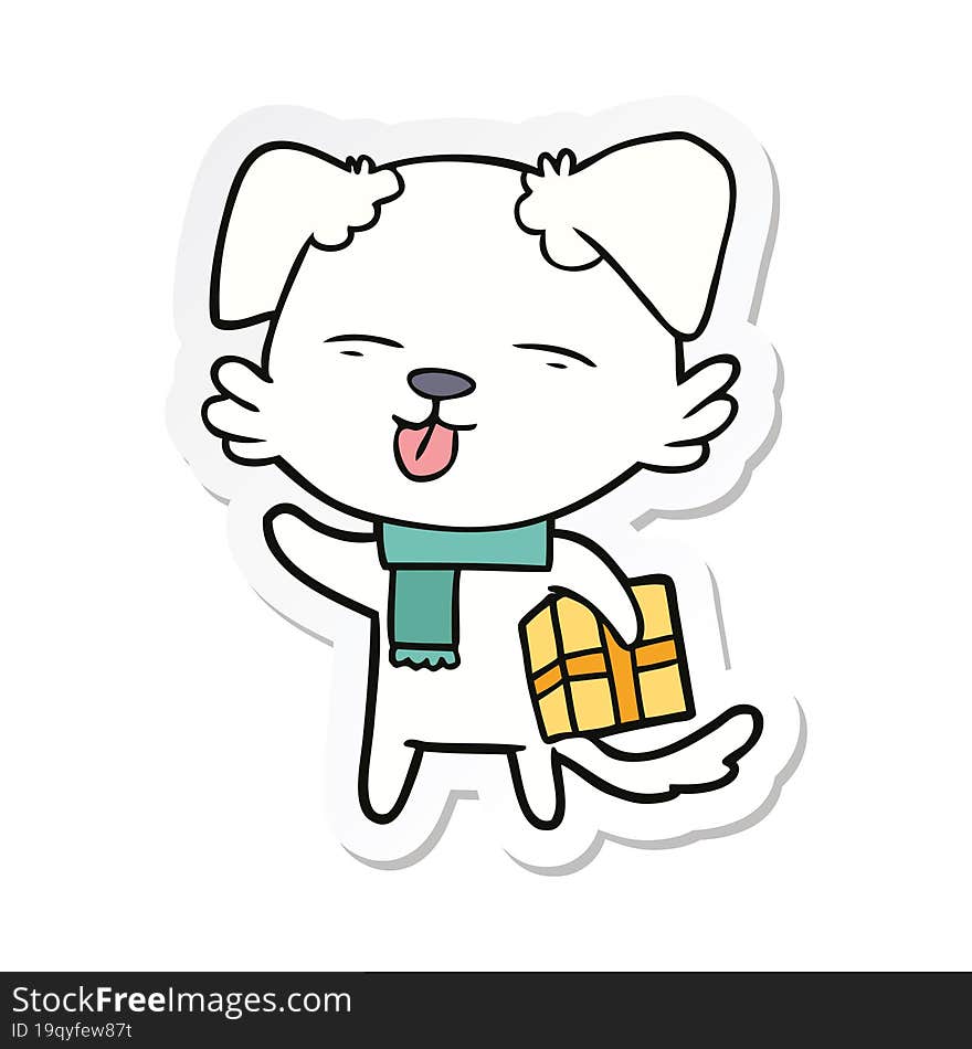 sticker of a cartoon dog with xmas gift