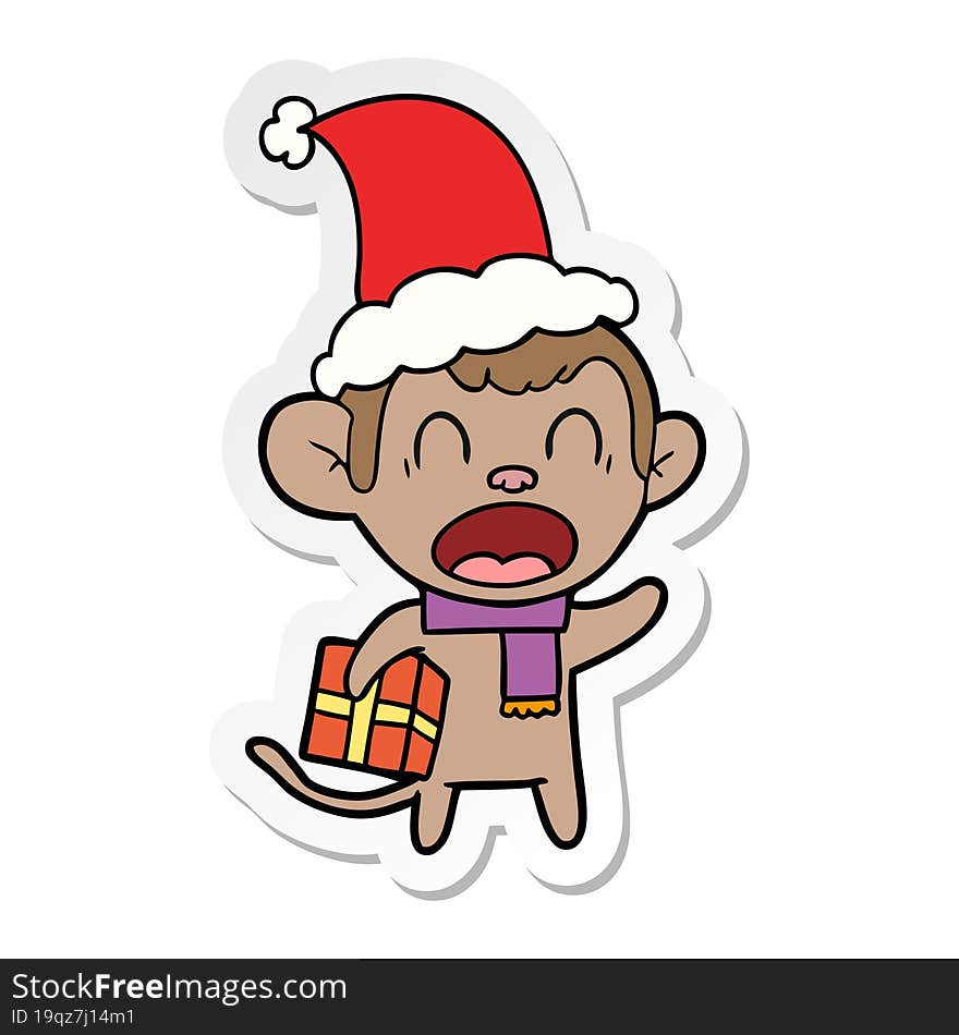 shouting sticker cartoon of a monkey carrying christmas gift wearing santa hat