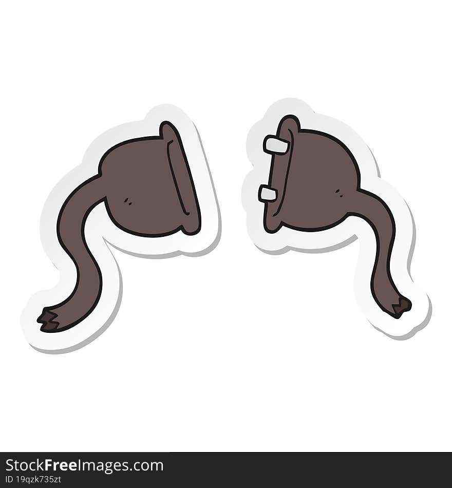 Sticker Of A Cartoon Electrical Plugs