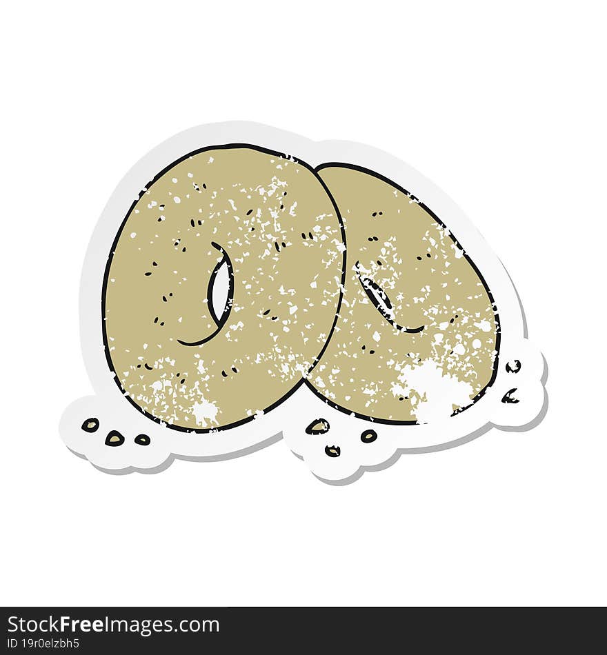 retro distressed sticker of a cartoon bagels