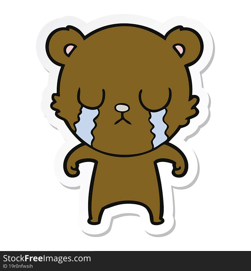 sticker of a crying cartoon bear