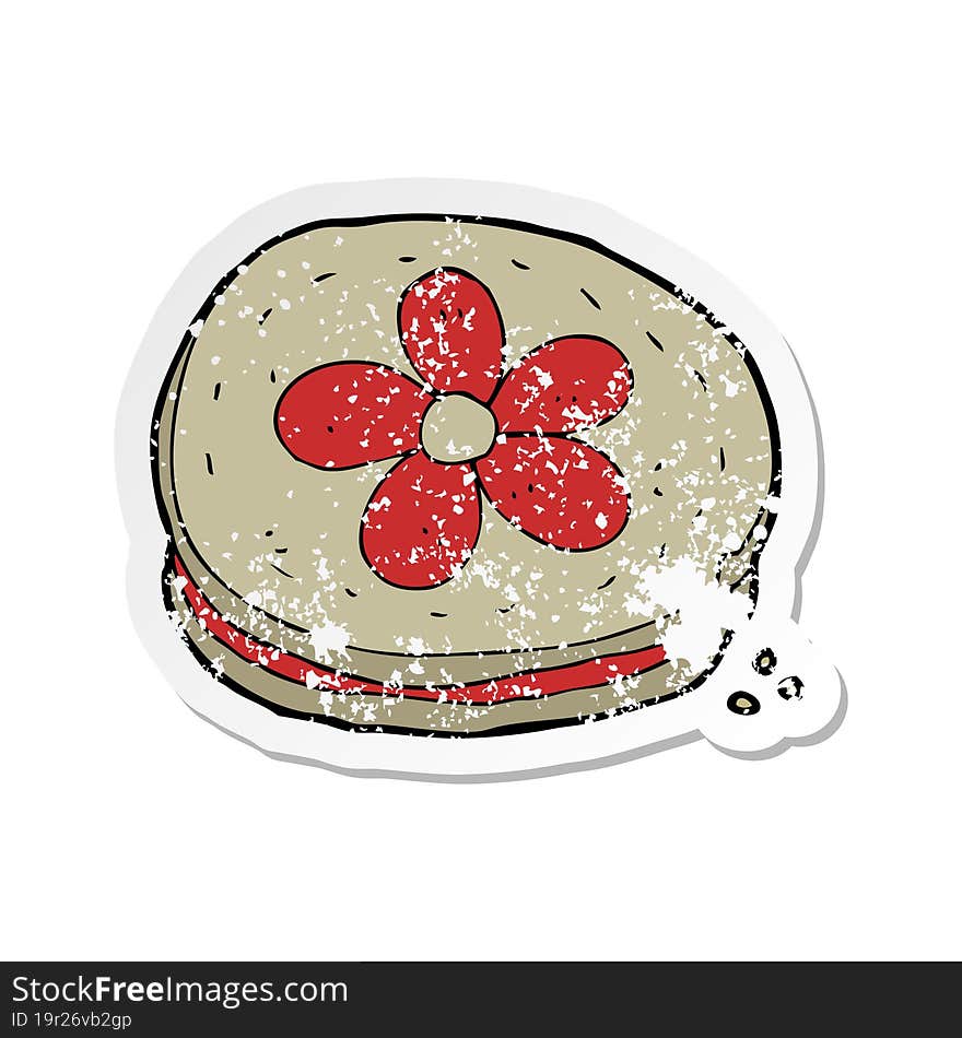 Retro Distressed Sticker Of A Cartoon Biscuit